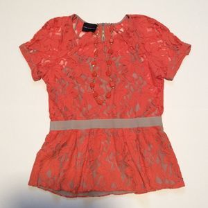 Beautiful orange peplum top size M